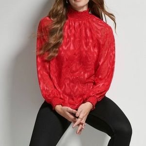 Calvin Klein red high neck blouse